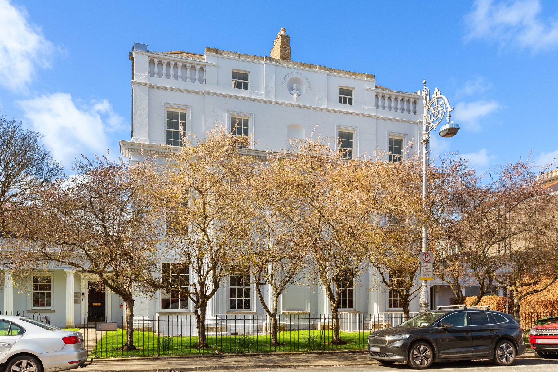 6-7 Harcourt Terrace, Dublin 2: the white-rendered period facade behind the trees