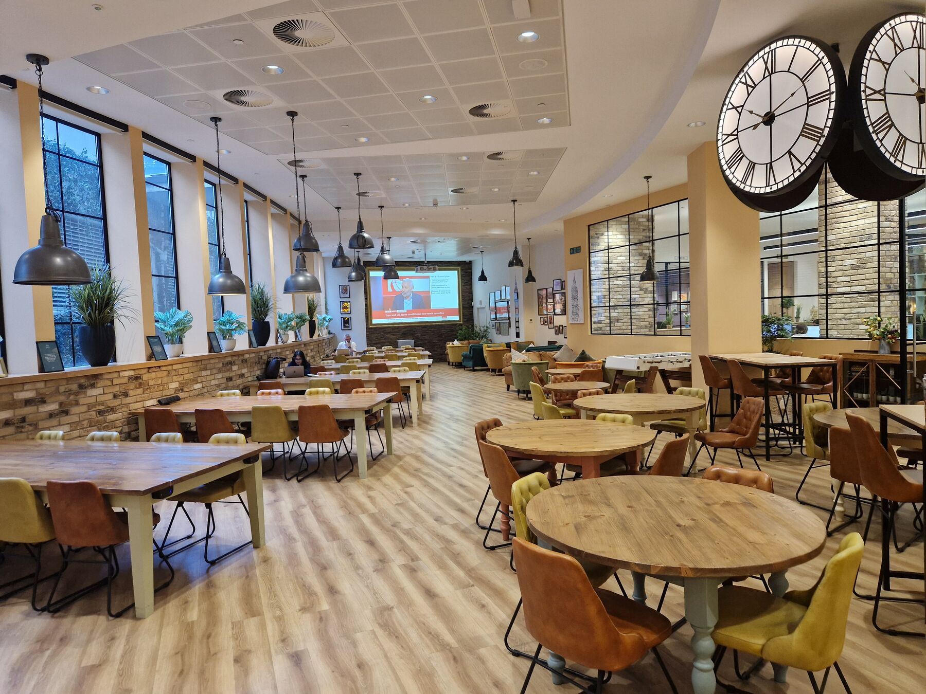 The White House, London: the occupier café with its twin station clocks